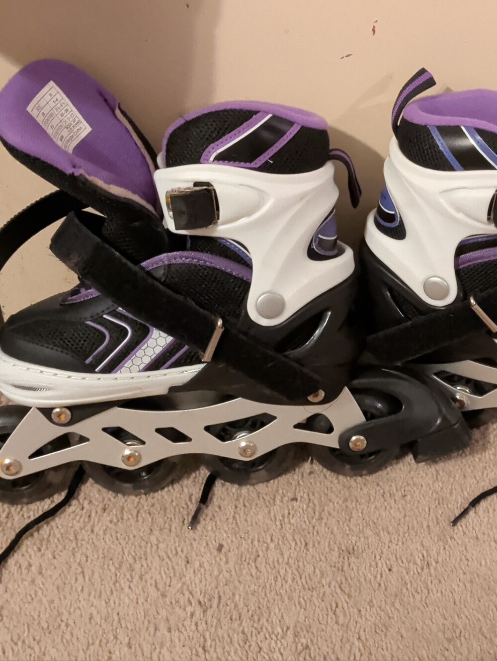 Adjustable Kids Black and Purple Inline Skates with Secure Buckle